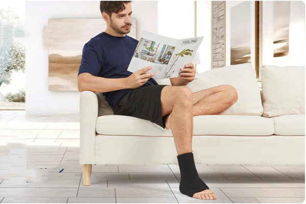 Hot and cold ankle compression sleeve worn at home for daily comfort and support