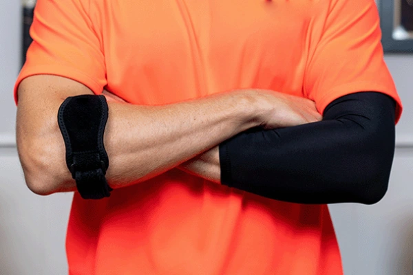 Arm sleeve, elbow strap, and elbow brace shown side by side for comparison