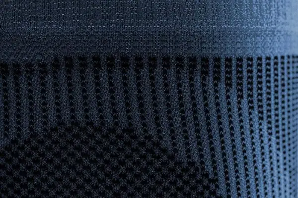 Close-up of moisture-wicking compression sleeve fabric used for baseball