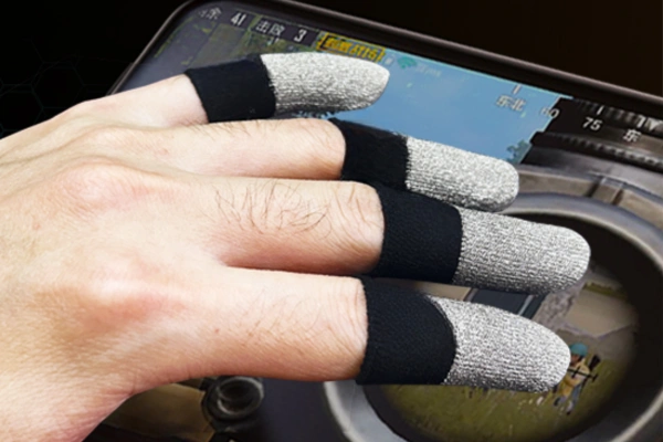 Comparing silver fiber and carbon fiber gaming thumb sleeve materials for speed versus control