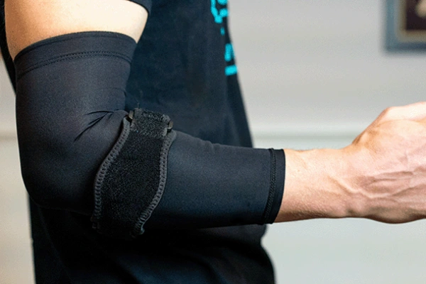 Compression arm sleeve and counterforce elbow strap side-by-side comparison