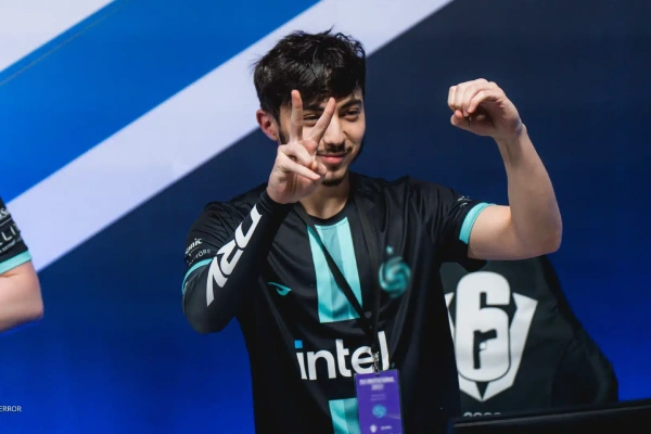 Esports player on stage competing while wearing a gaming arm sleeve