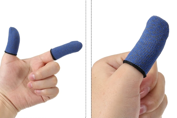 Gaming finger sleeves on thumbs for consistent touch control on a smartphone screen