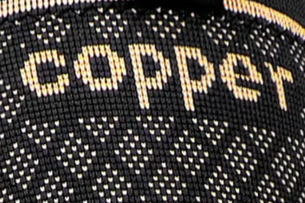 Fabric detail showing woven “copper” text created using Jacquard Knitting logo technique